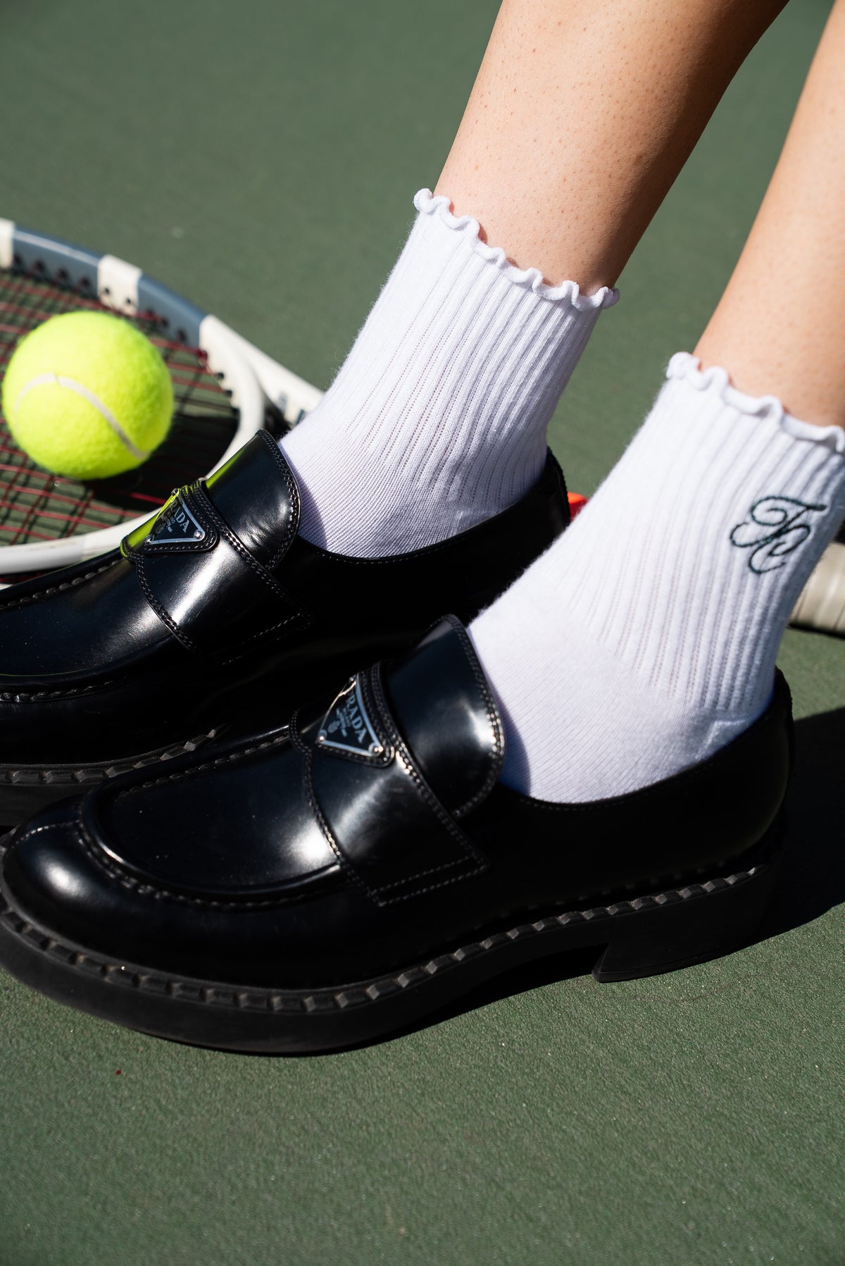 Tennis Club white ruffle crew socks with embroidered TC monogram