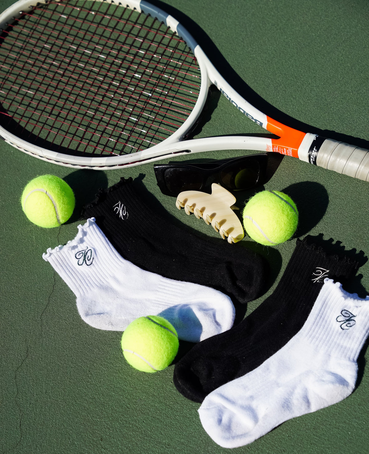 Tennis Club white ruffle crew socks with embroidered TC monogram