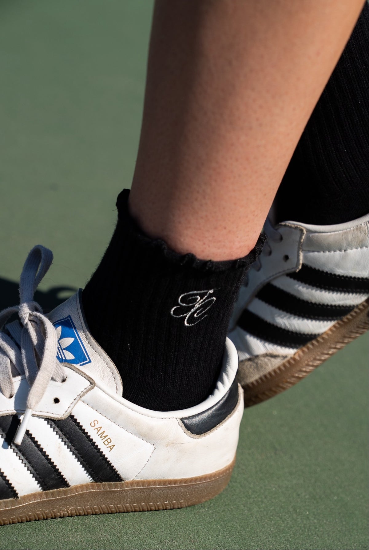 Tennis Club ruffle crew socks with embroidered TC monogram